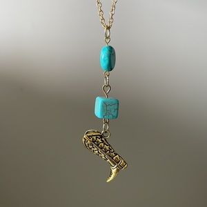 Cowboy boot and turquoise gemstone necklace